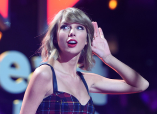 Taylor Swift performs during iHeartRadio Jingle Ball 2014, hosted by Z100 New York and presented by Goldfish Puffs, at Madison Square Garden in New York City on Dec. 12, 2014. Jamie McCarthy/Getty Images for iHeartMedia
